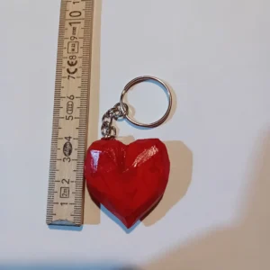 Hand-carved, heart-shaped wooden key ring – available in a choice of colours, with a glossy finish