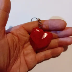 Hand-carved, heart-shaped wooden key ring – available in a choice of colours, with a glossy finish